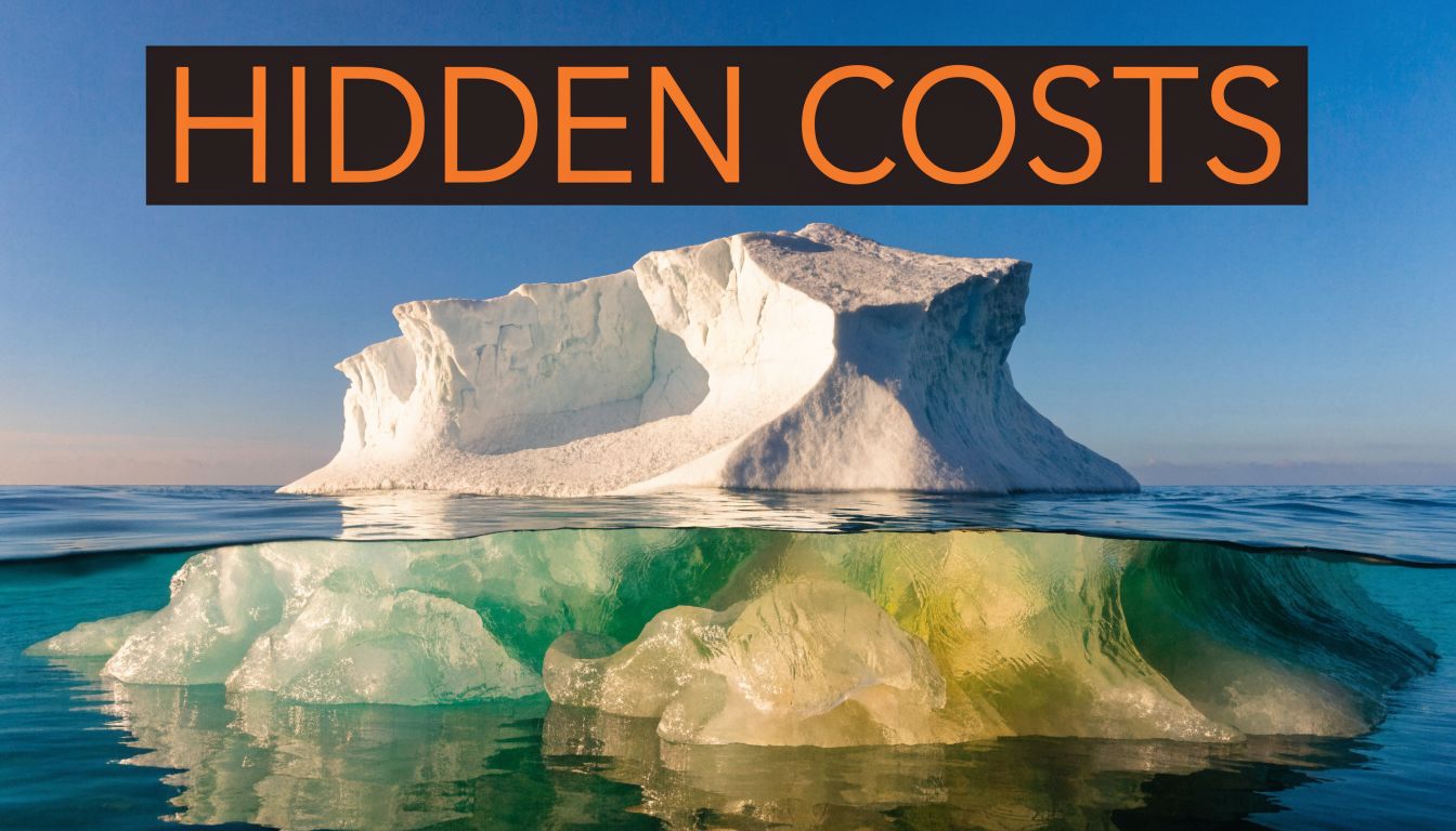 An iceberg floating in water with a label reading Hidden Costs above it representing hidden business expenses.