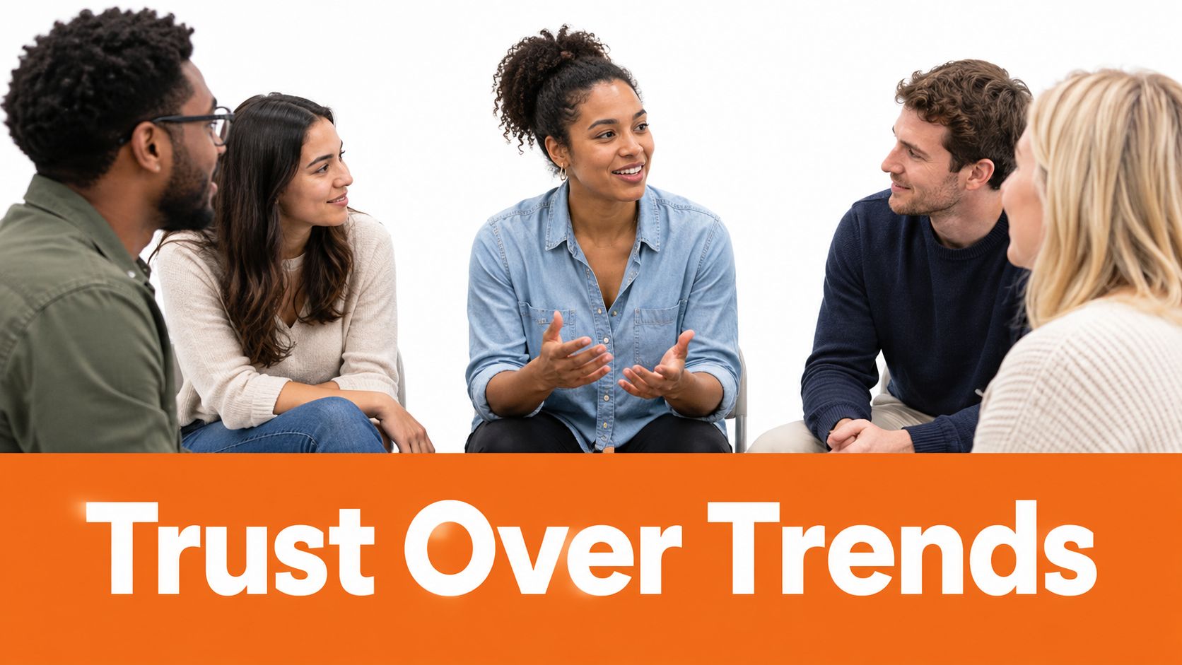 A diverse group of professionals sitting in a circle having a discussion about building a sustainable brand.